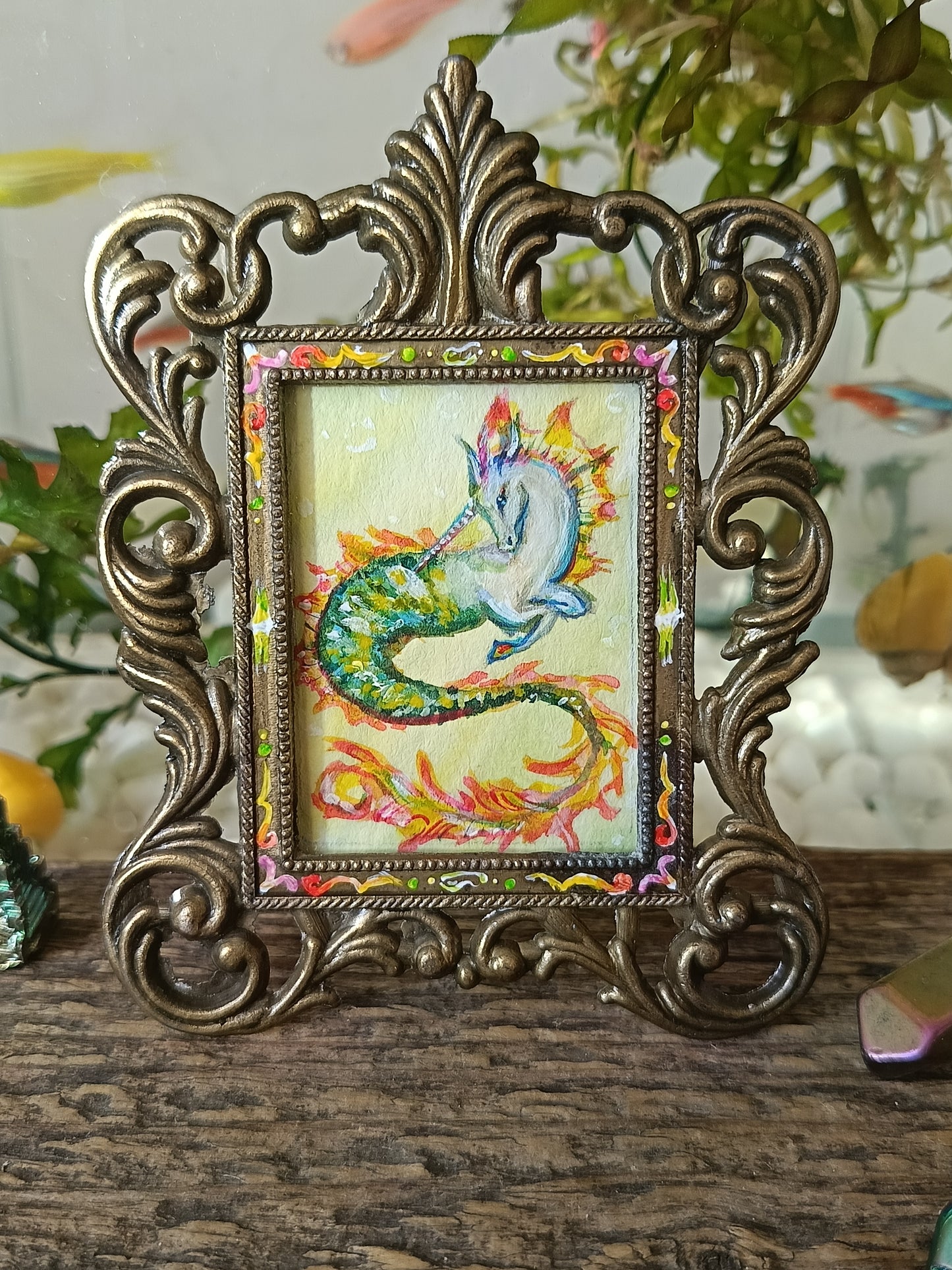 Magic unicorn. Miniature watercolour painting in a frame.