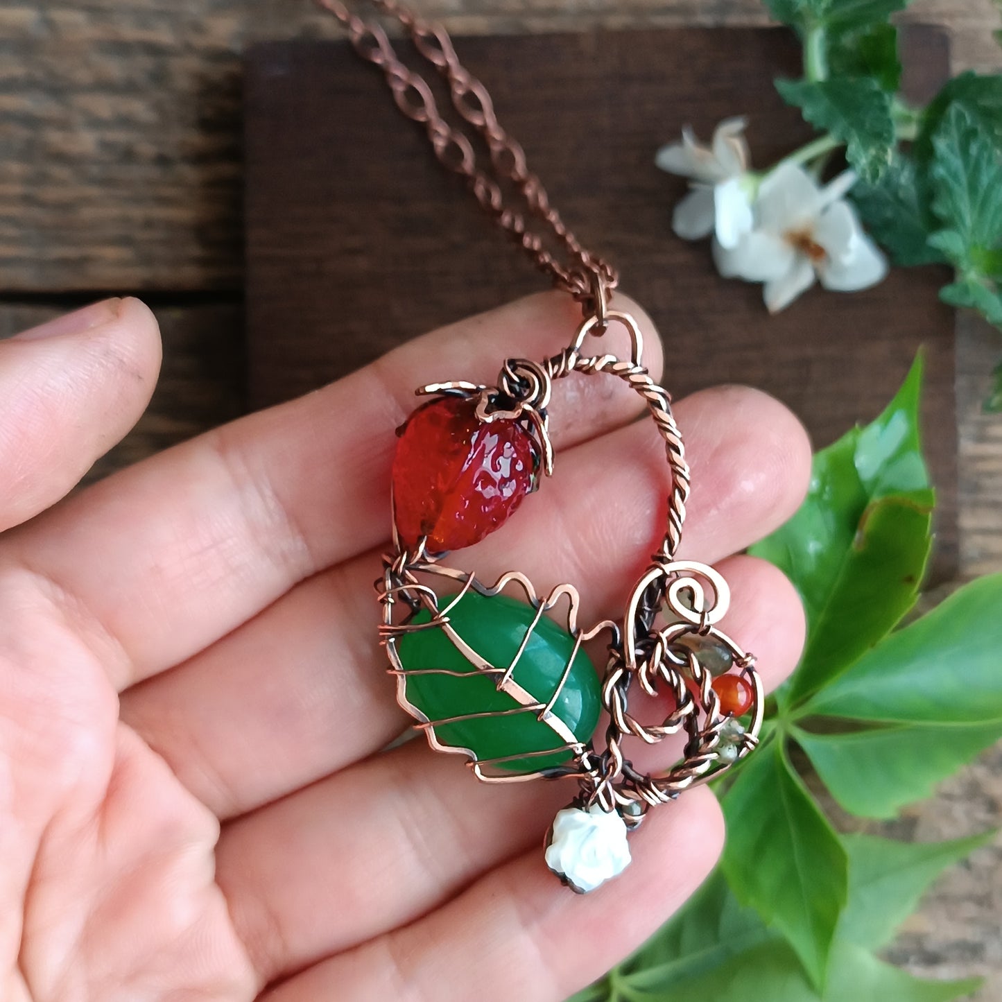Strawberry necklace.
