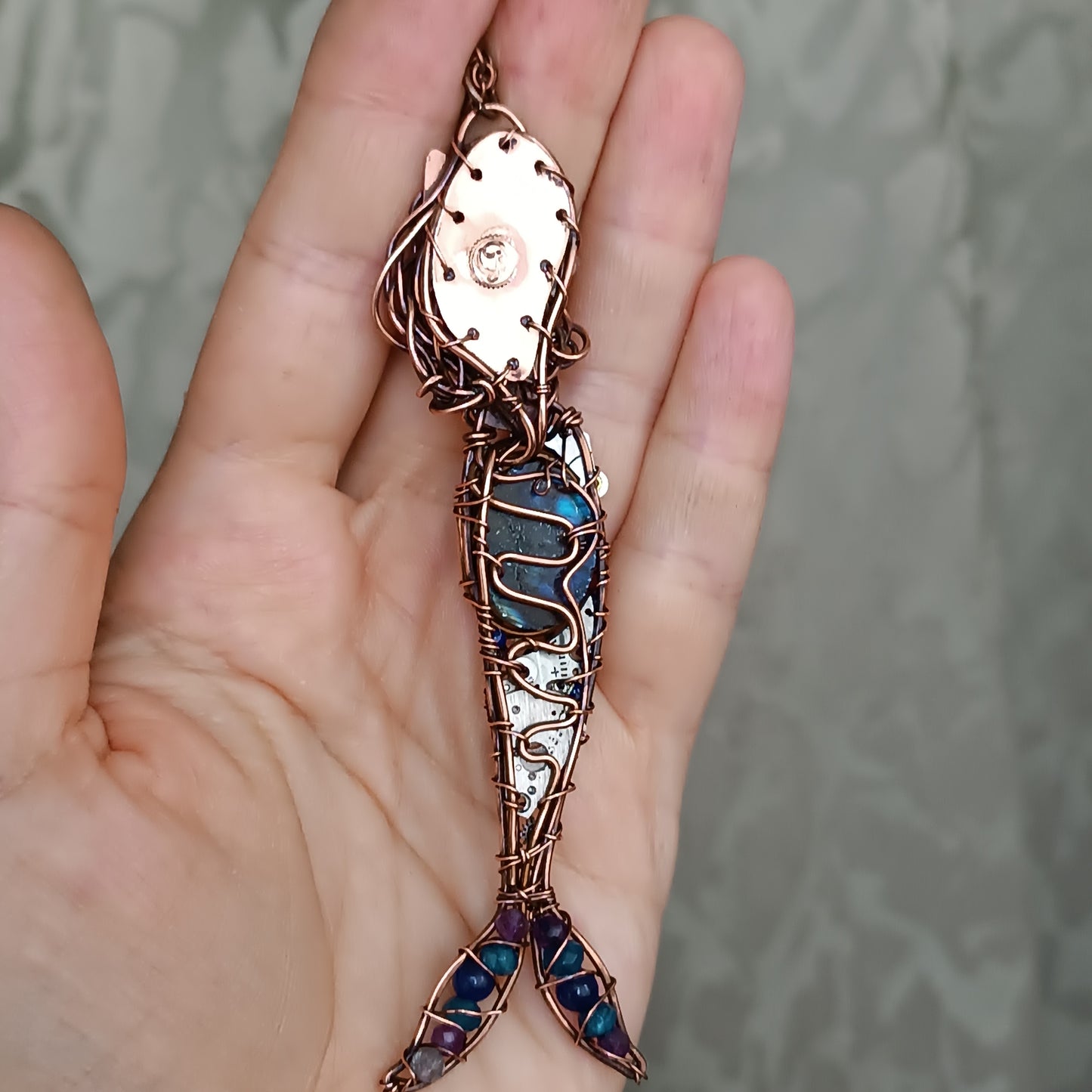 Blue mermaid with steampunk vibe.