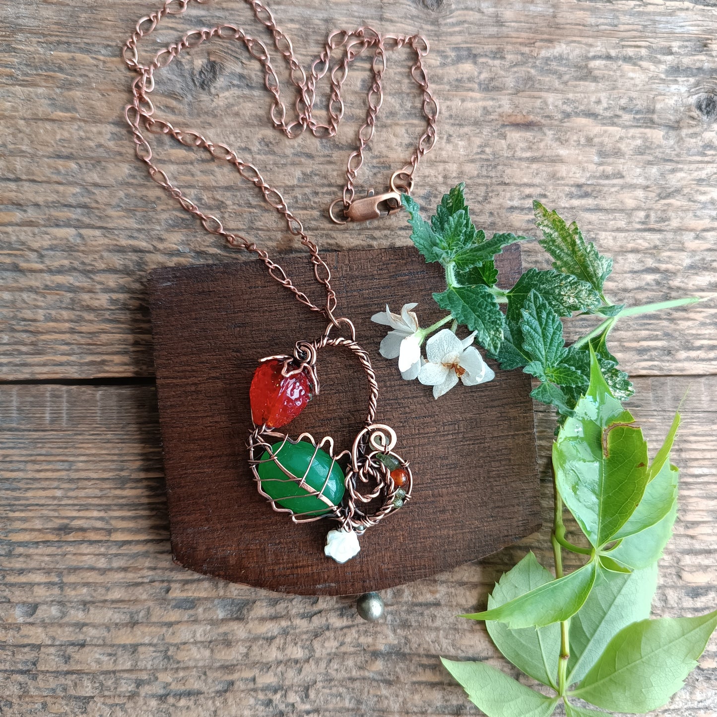 Strawberry necklace.