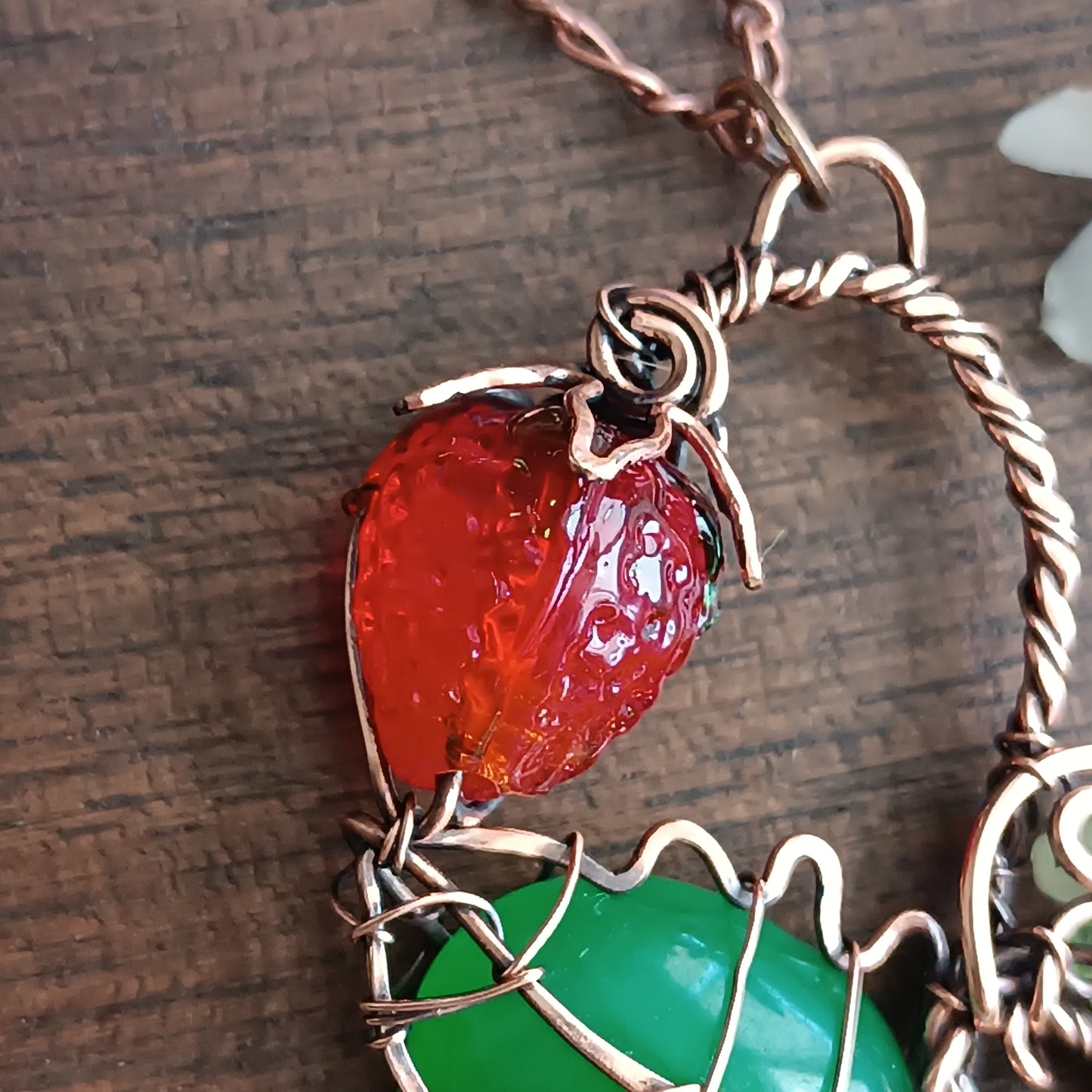 Strawberry necklace.
