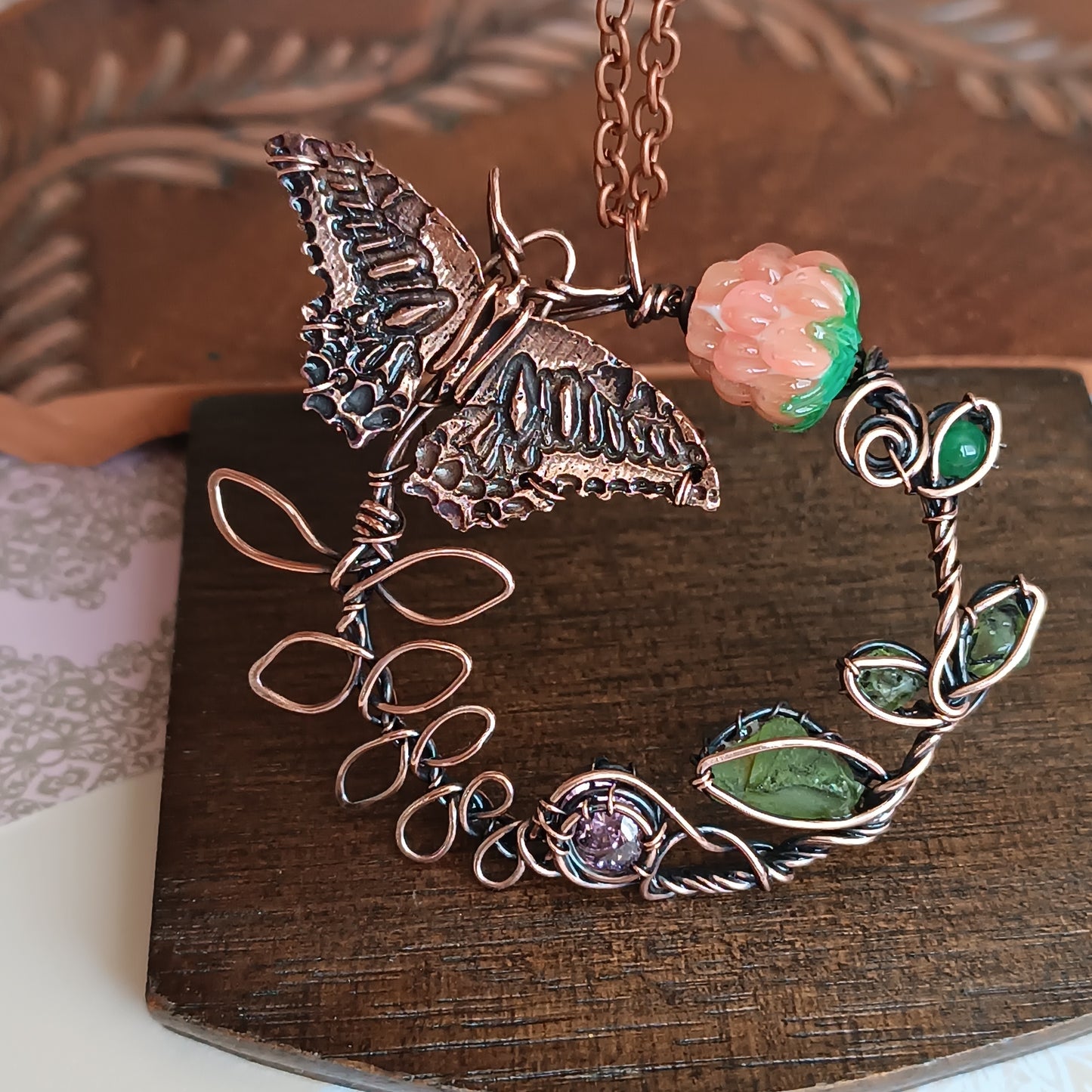 Life circle. Pink raspberry butterfly necklace