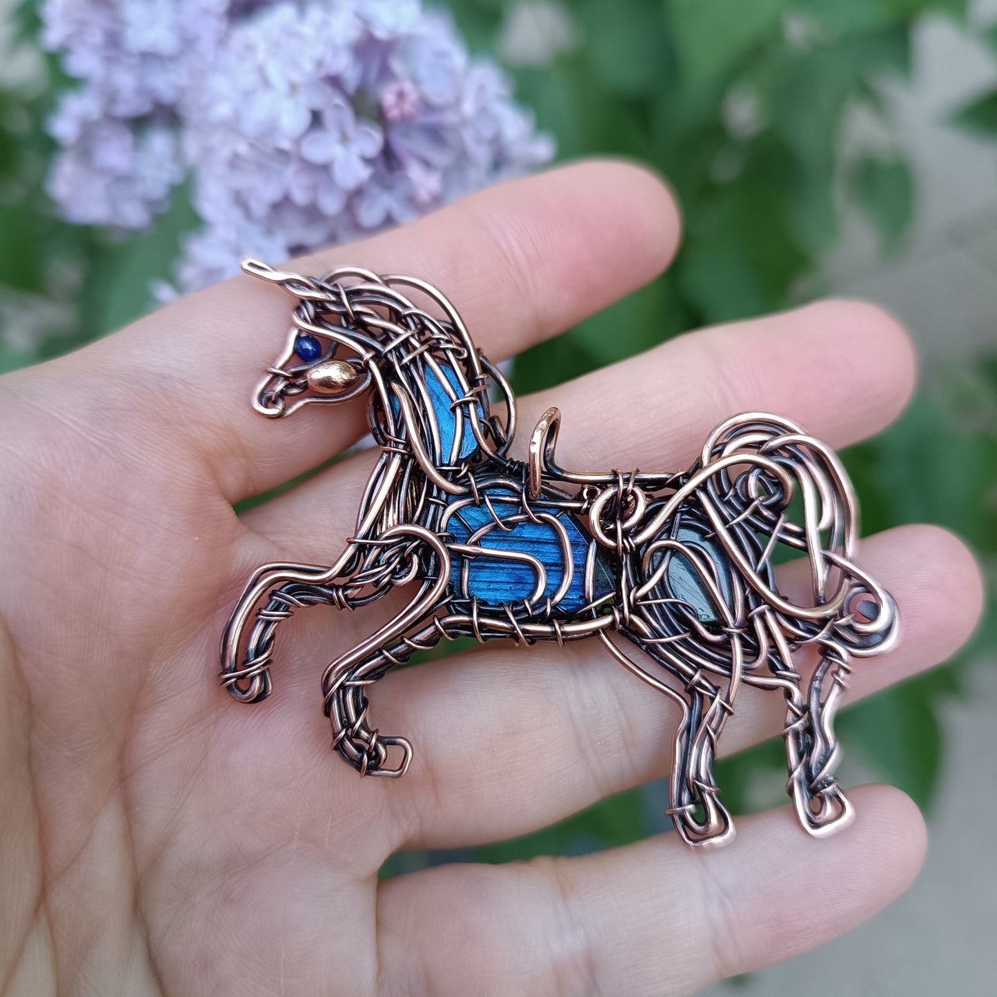 Blue wind. Unicorn pendant.