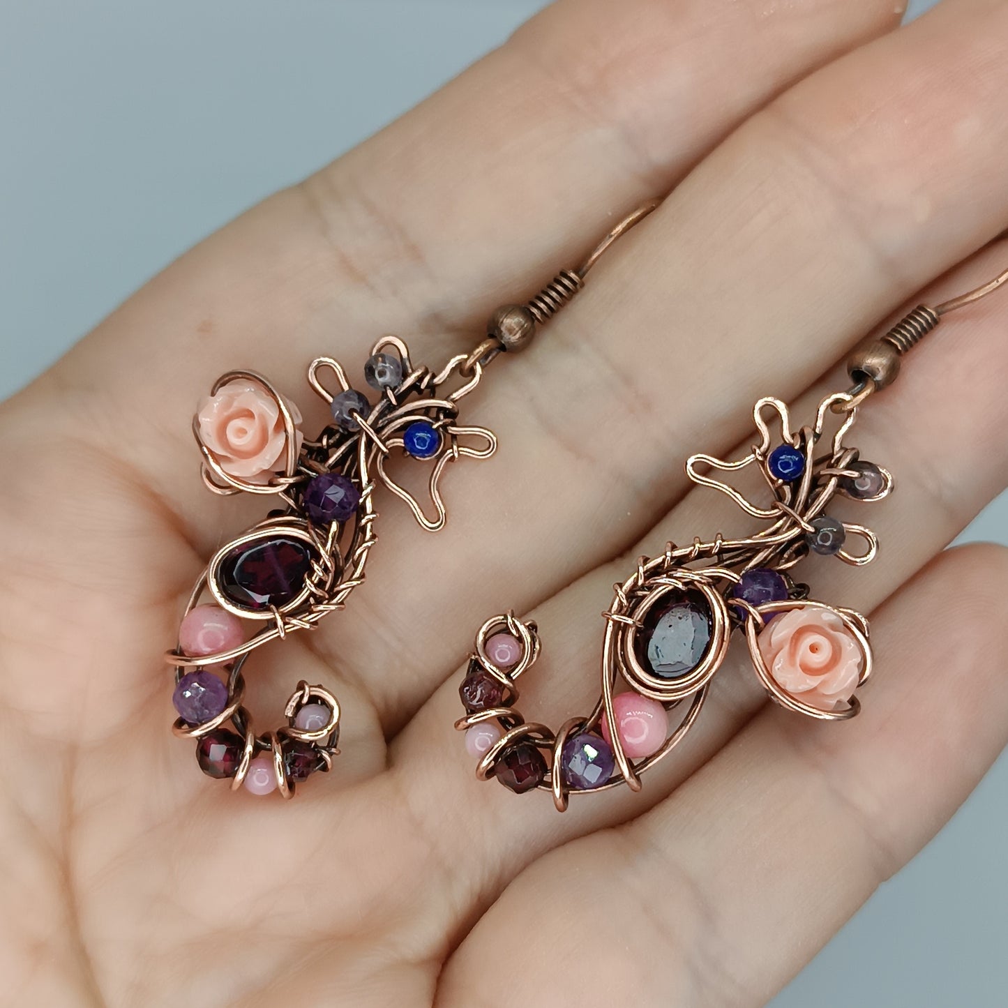 Seahorse dangling earrings.