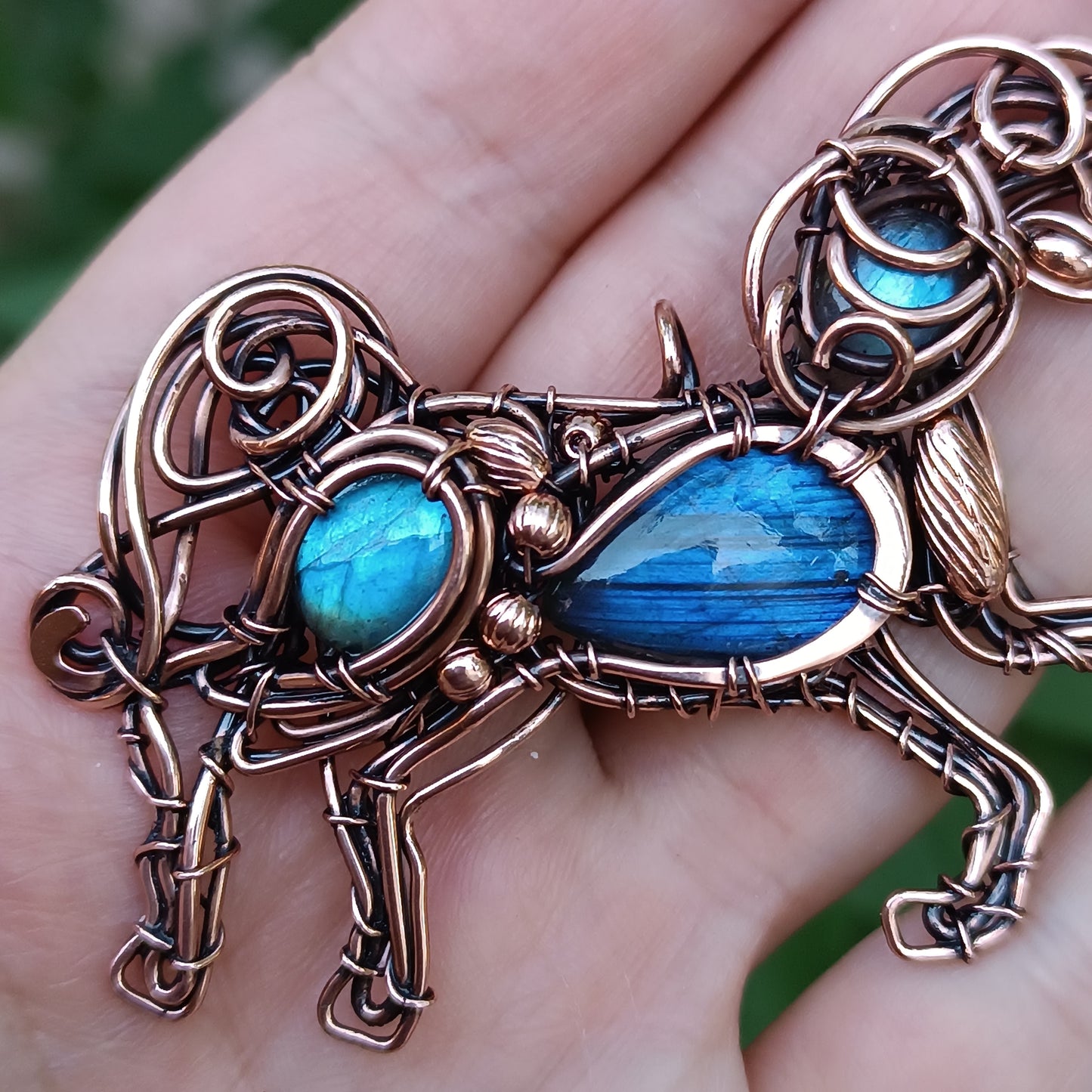 Blue wind. Unicorn pendant.