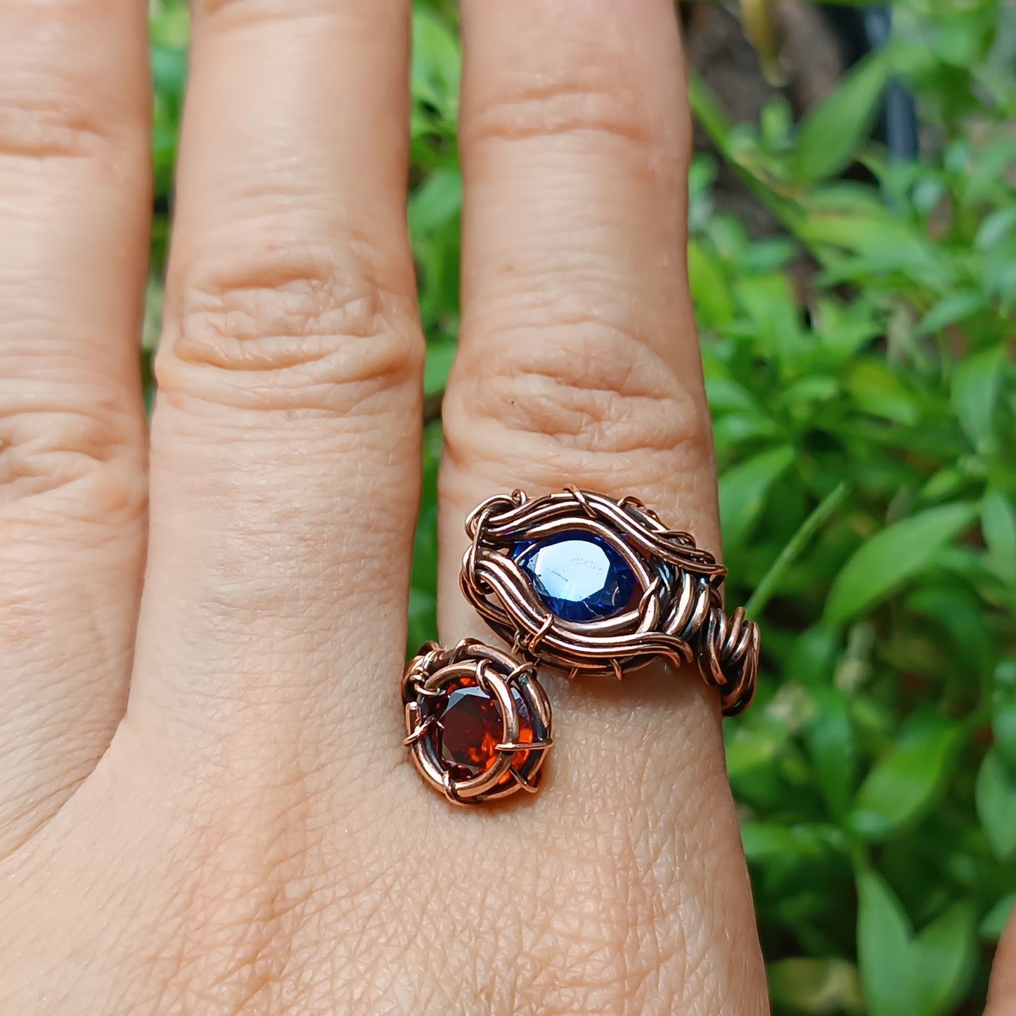 Red and blue CZ ring. Adjustable