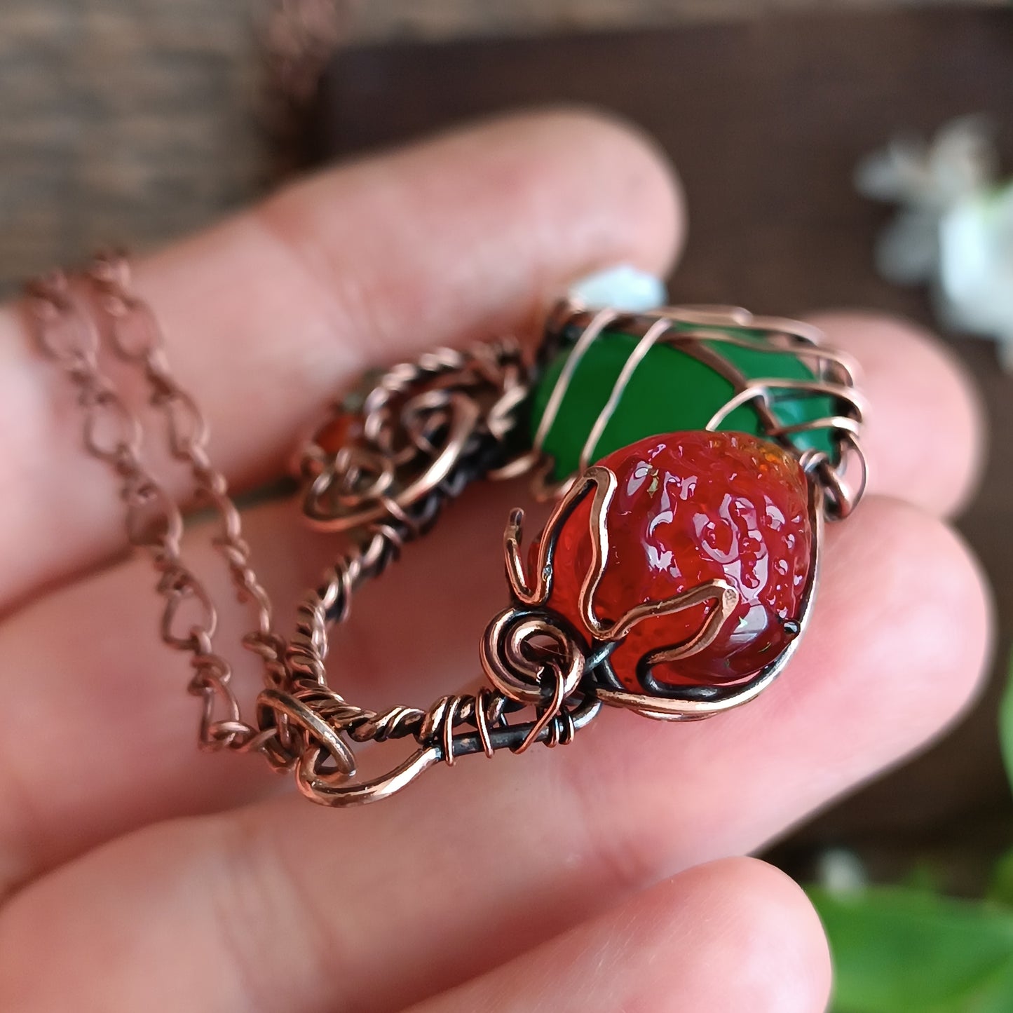 Strawberry necklace.