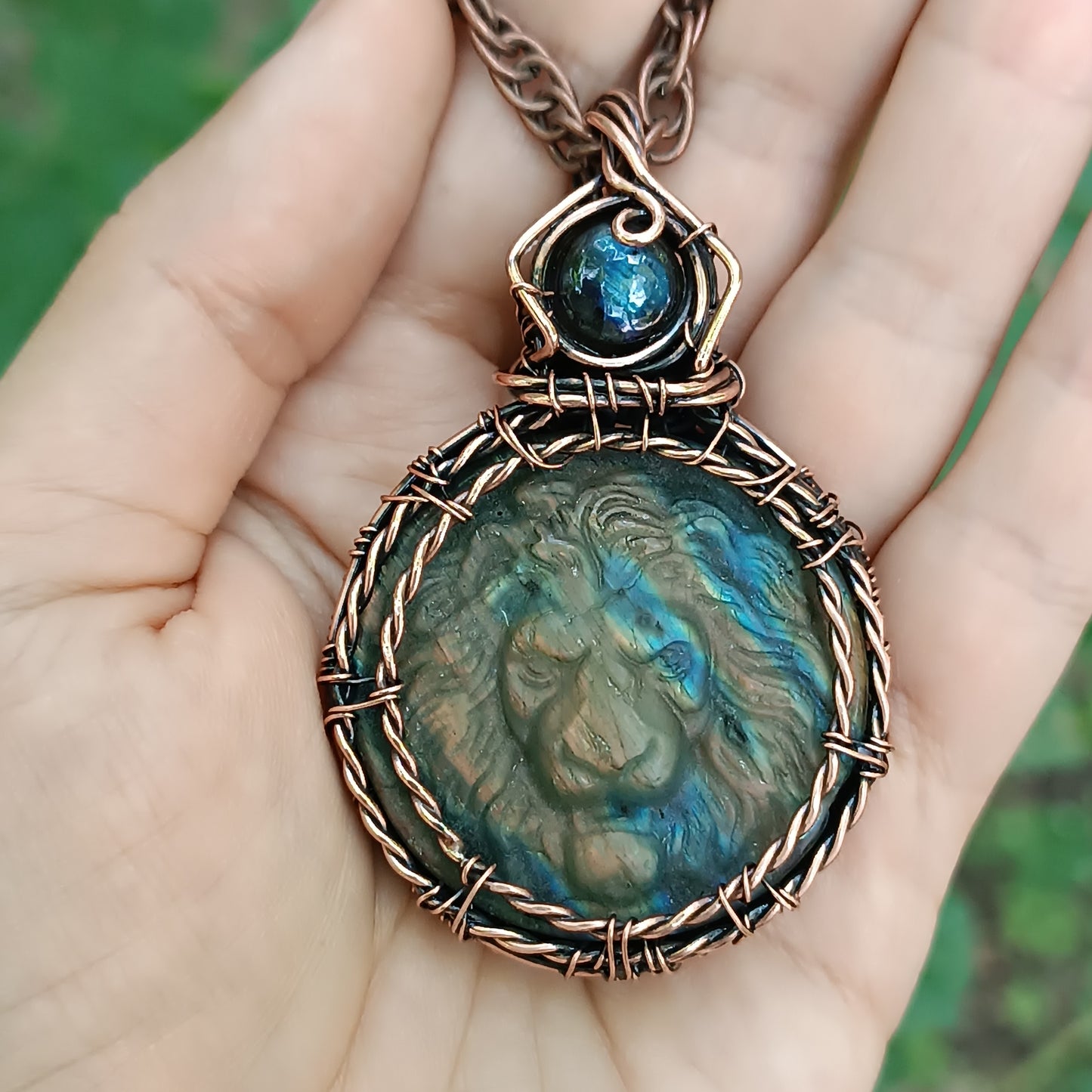 Carved leo labradorite necklace.