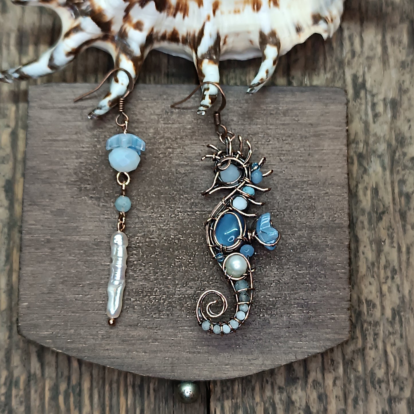 Blue and white seahorse earrings
