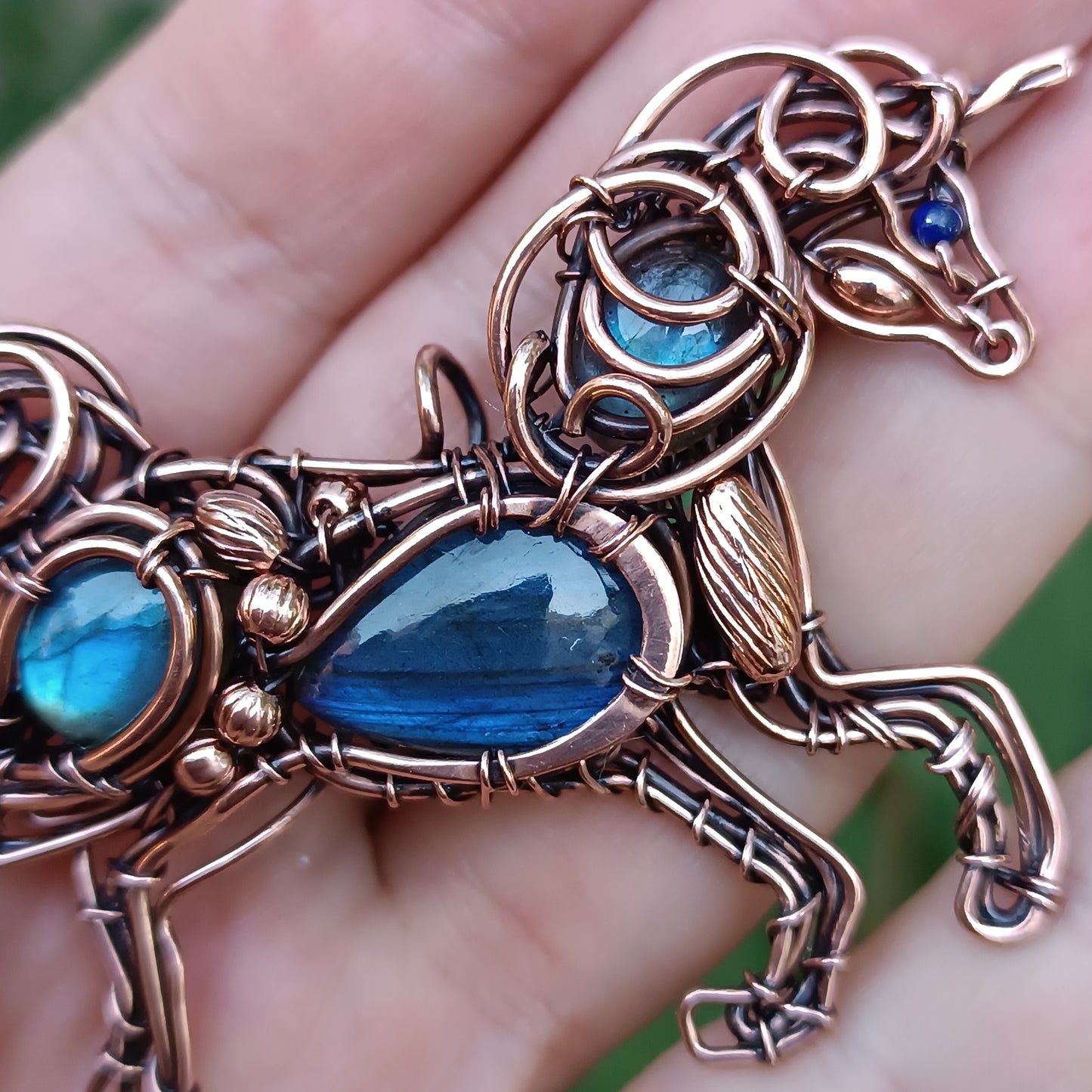 Blue wind. Unicorn pendant.
