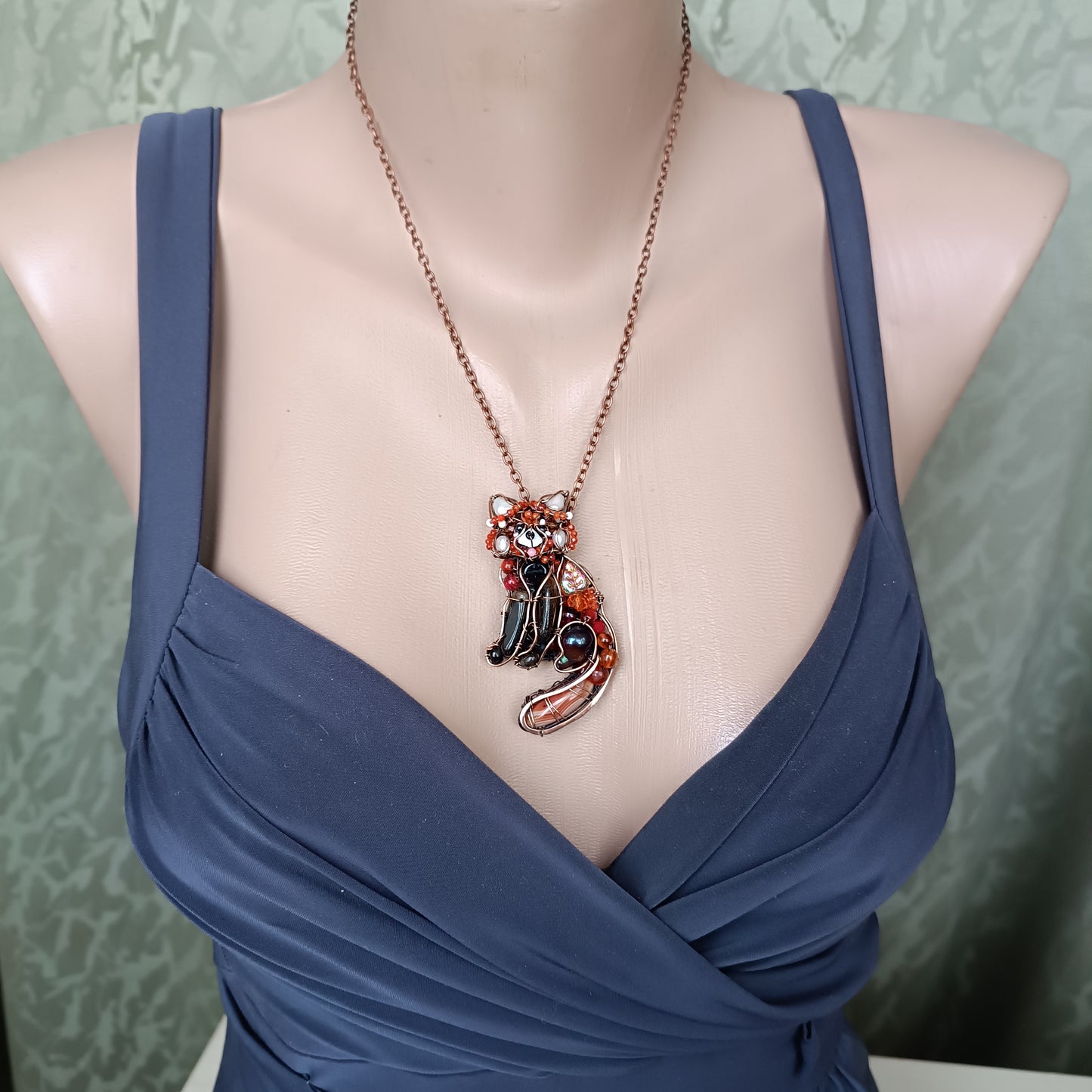 For Hanne. Red panda pendant