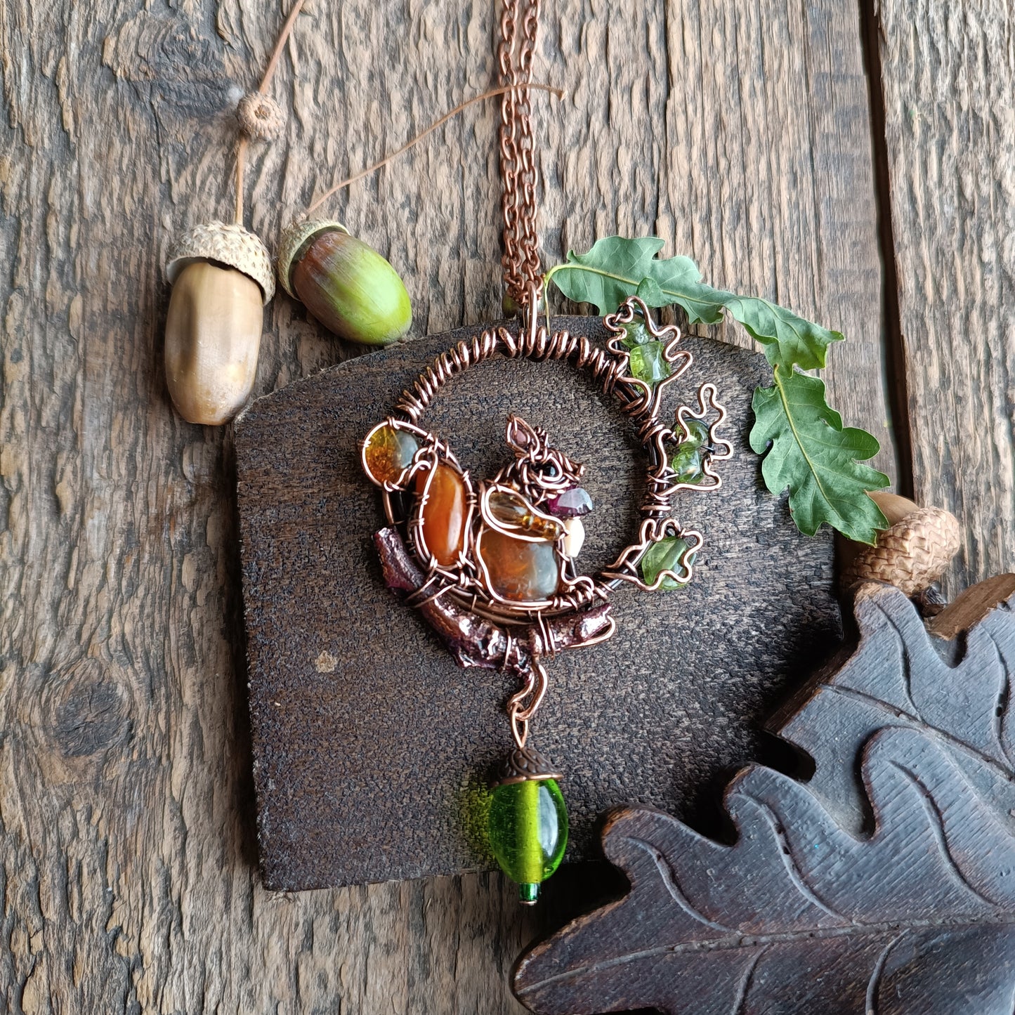 Cute squirrel on the oak tree. necklace π