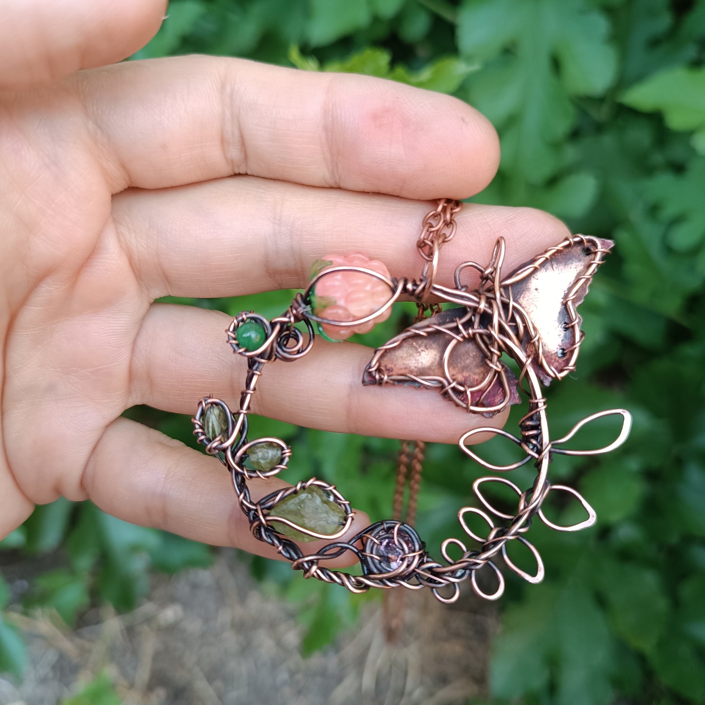 Life circle. Pink raspberry butterfly necklace