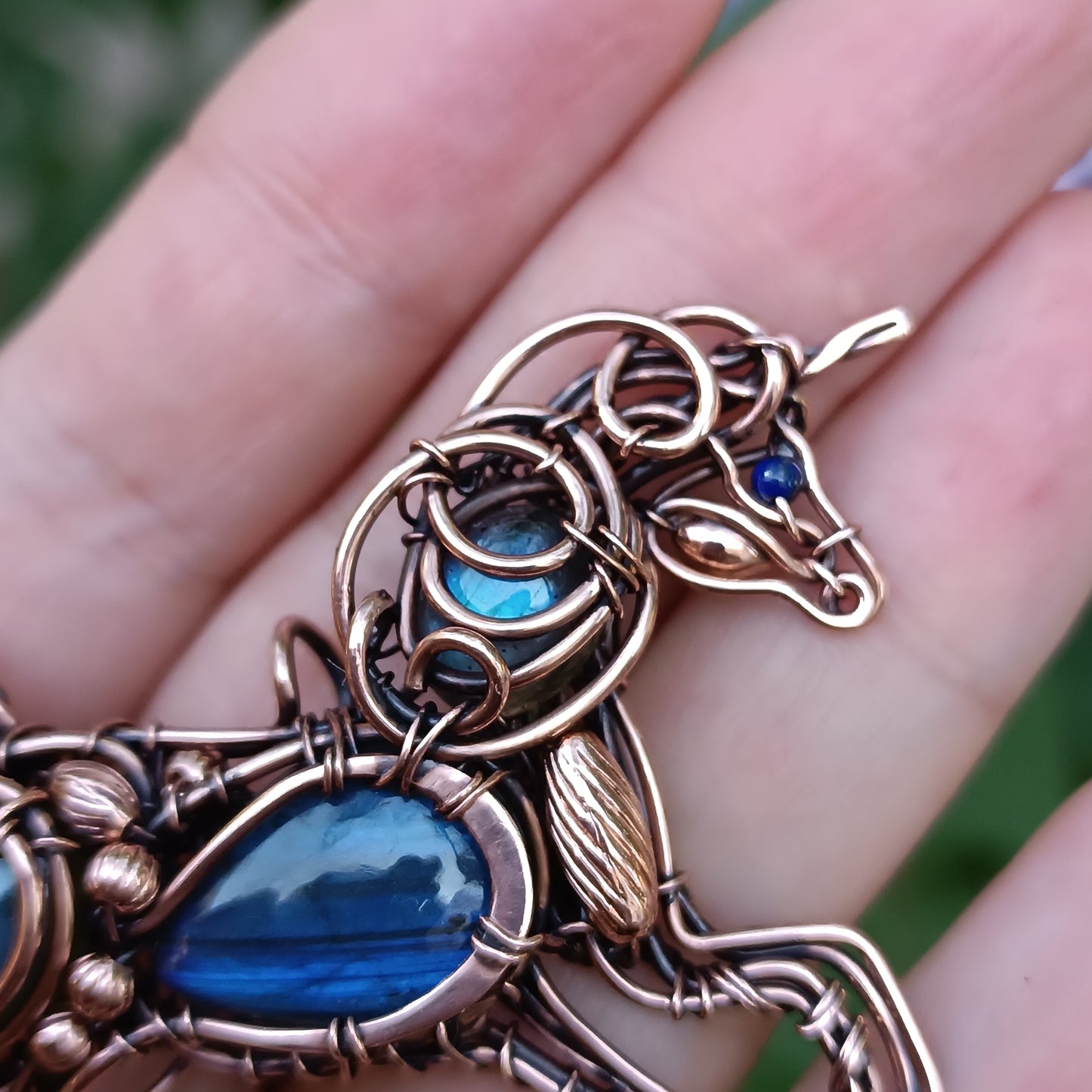 Blue wind. Unicorn pendant.