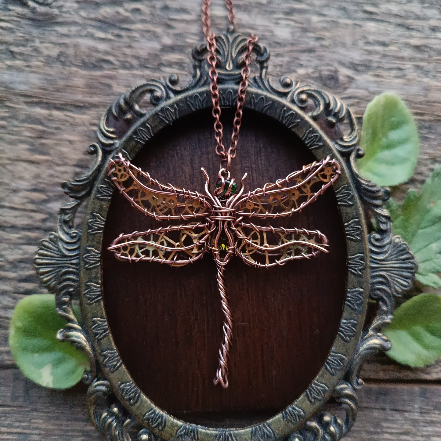 Olivia. Golden cogs Dragonfly pendant