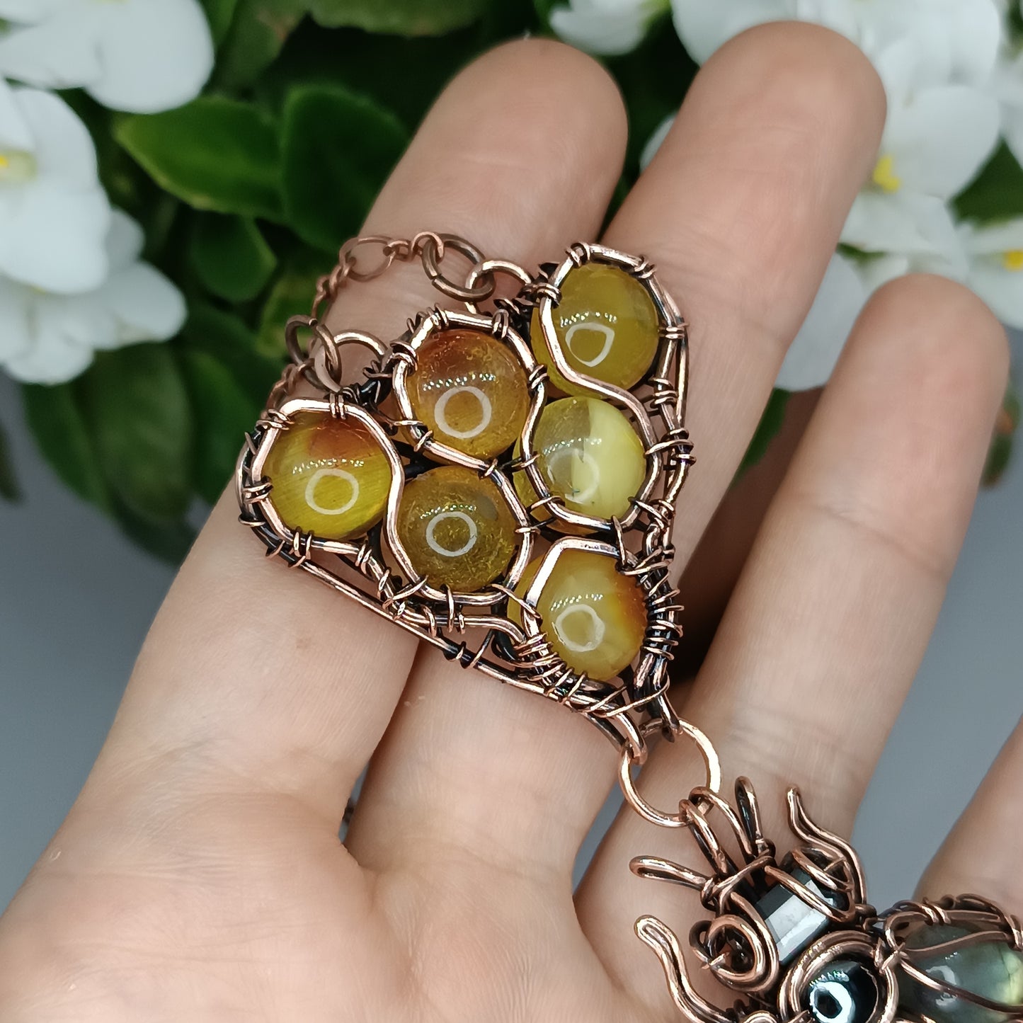 Bee and combs. Dangling necklace.