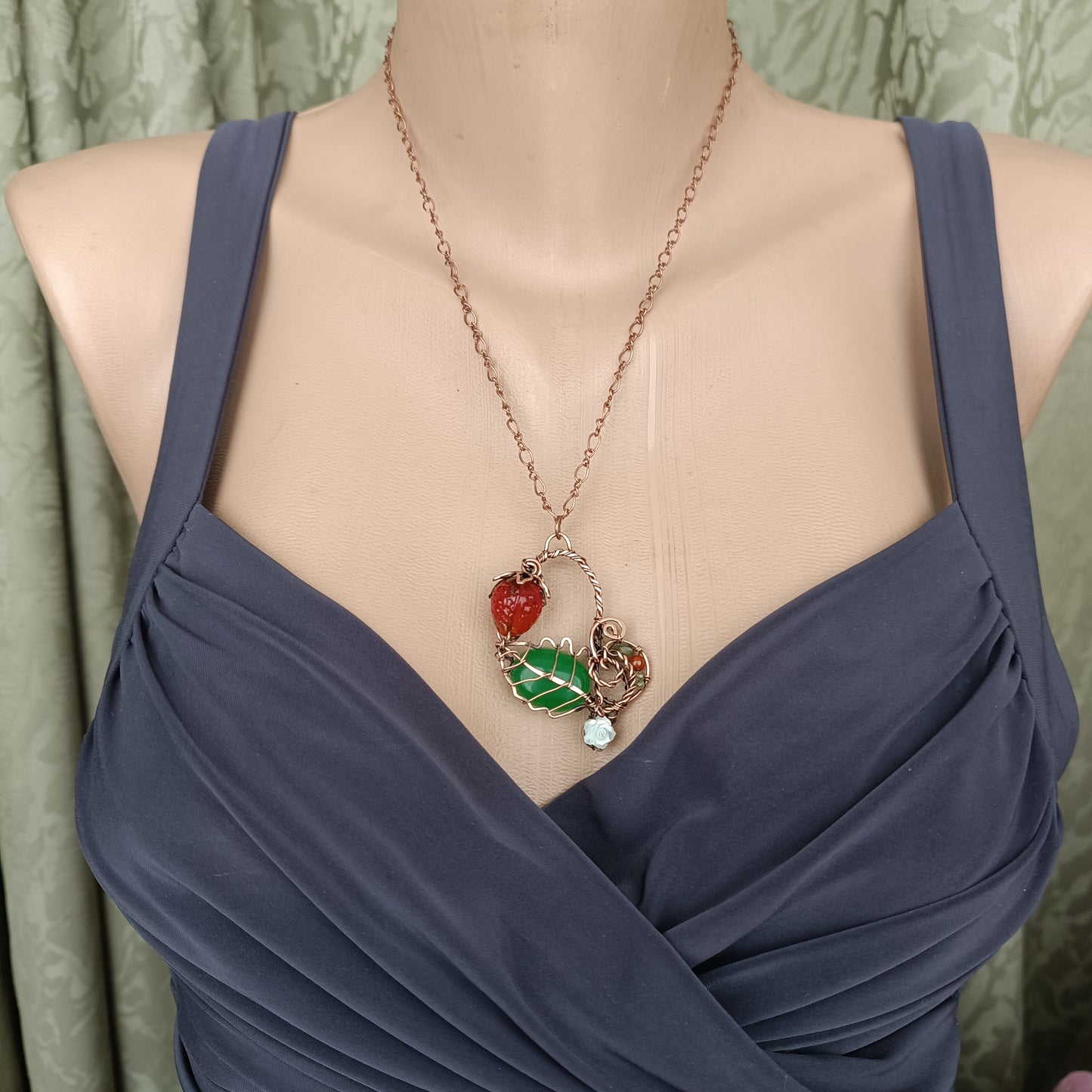 Strawberry necklace.