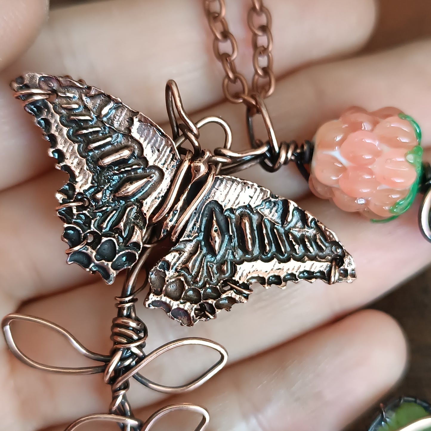Life circle. Pink raspberry butterfly necklace