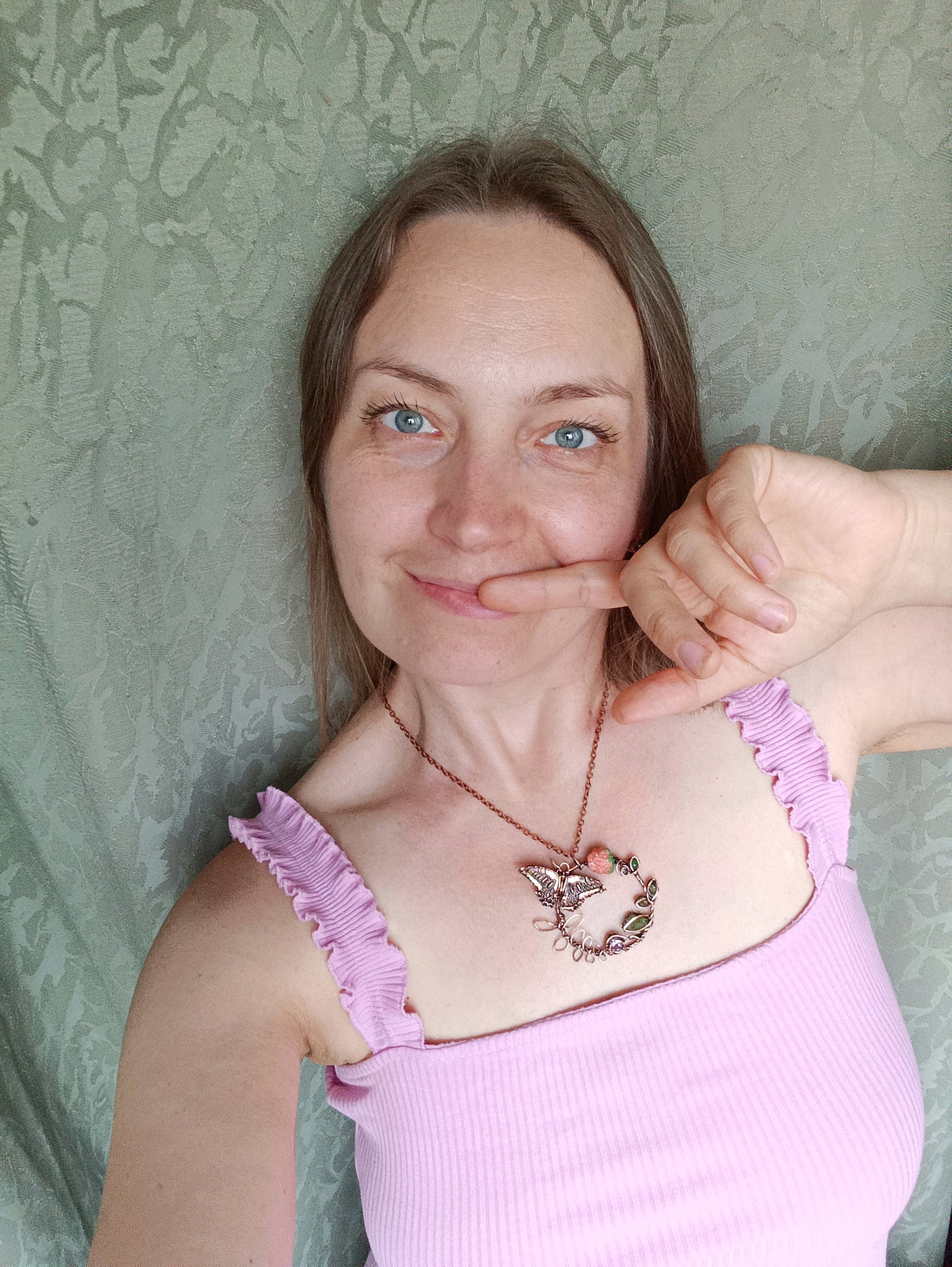 Life circle. Pink raspberry butterfly necklace
