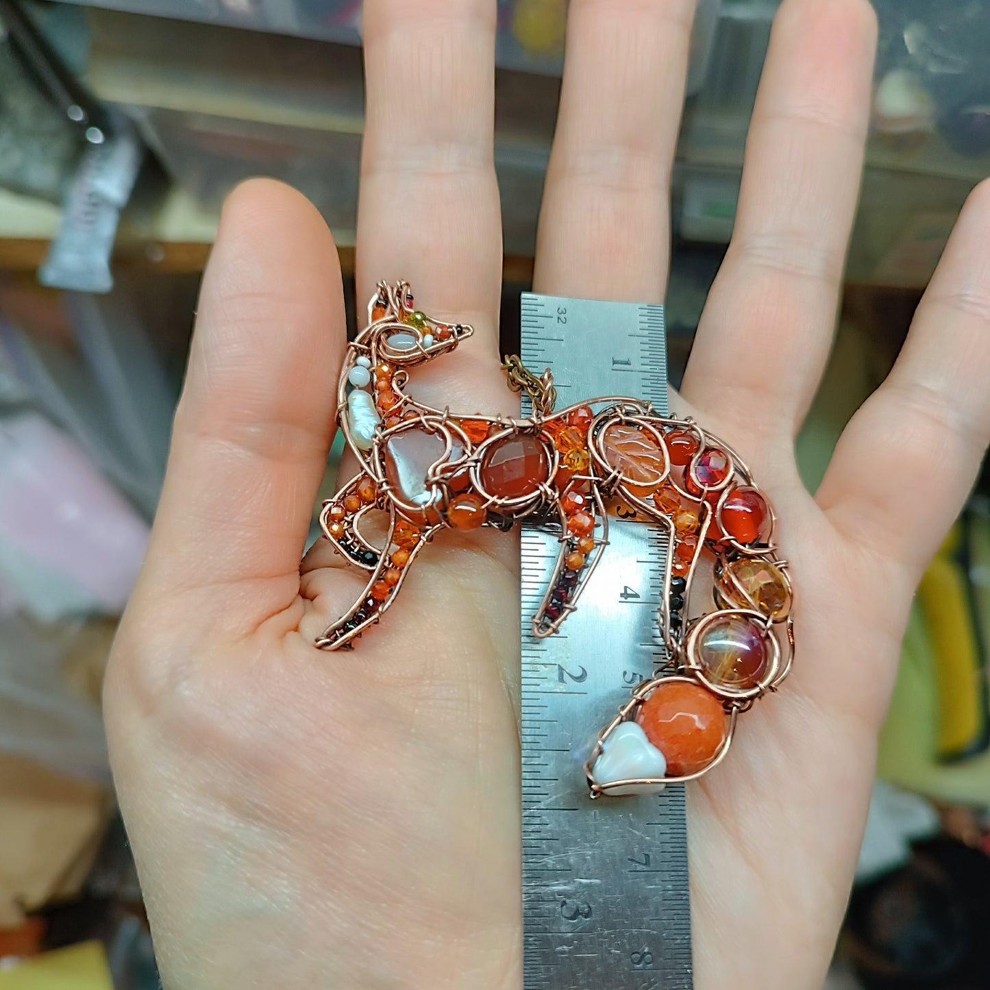 Foxy the swoopy tail! Copper necklace with carnelians.
