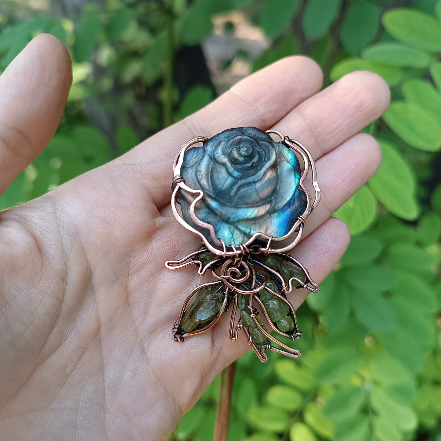 Glowing rose pendant