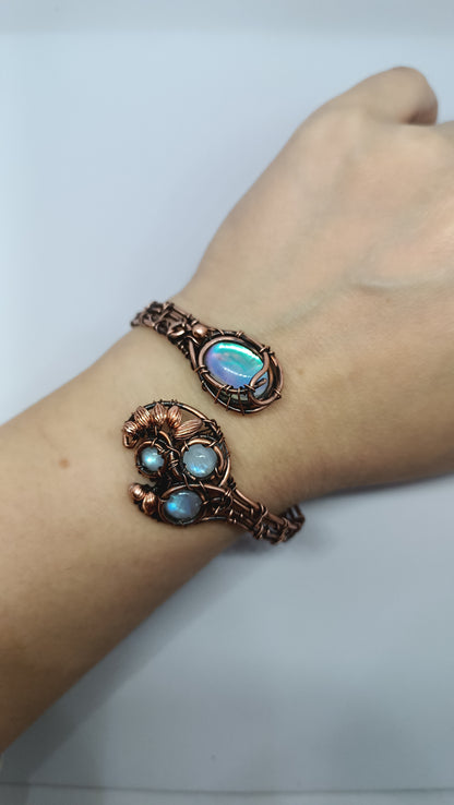 S-M size wrist Adjustable copper bracelet with moonstones and rainbow quartz.