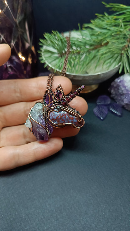 Lilac unicorn pendant.