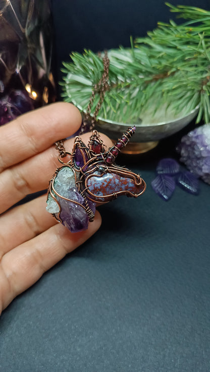 Lilac unicorn pendant.