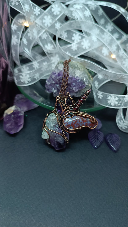 Lilac unicorn pendant.