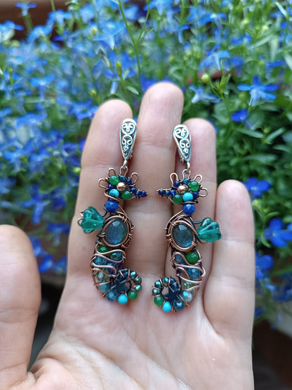 Seahorse earrings.