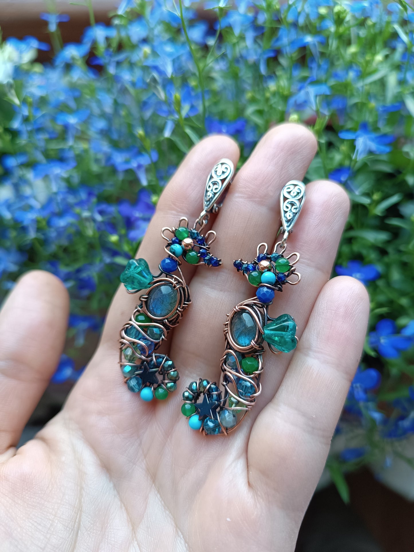 Seahorse earrings.