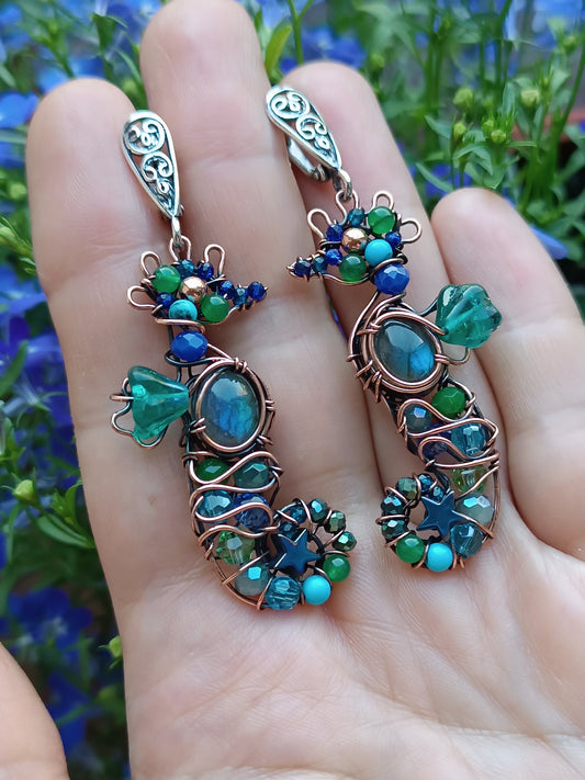 Seahorse earrings.