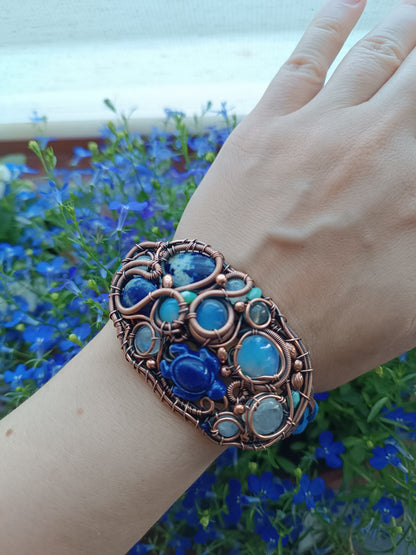 Wire wrapped bracelet with sea turtle