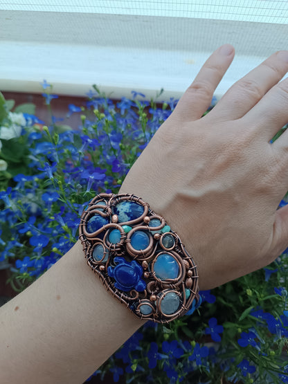 Wire wrapped bracelet with sea turtle