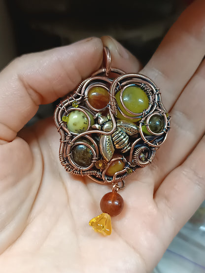 Bee pollinating. Wire wrapped pendant.