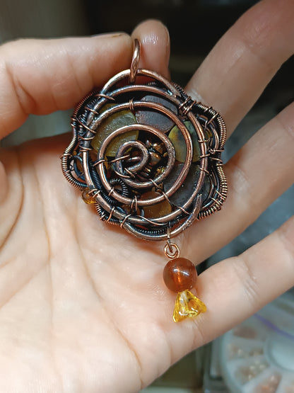 Bee pollinating. Wire wrapped pendant.