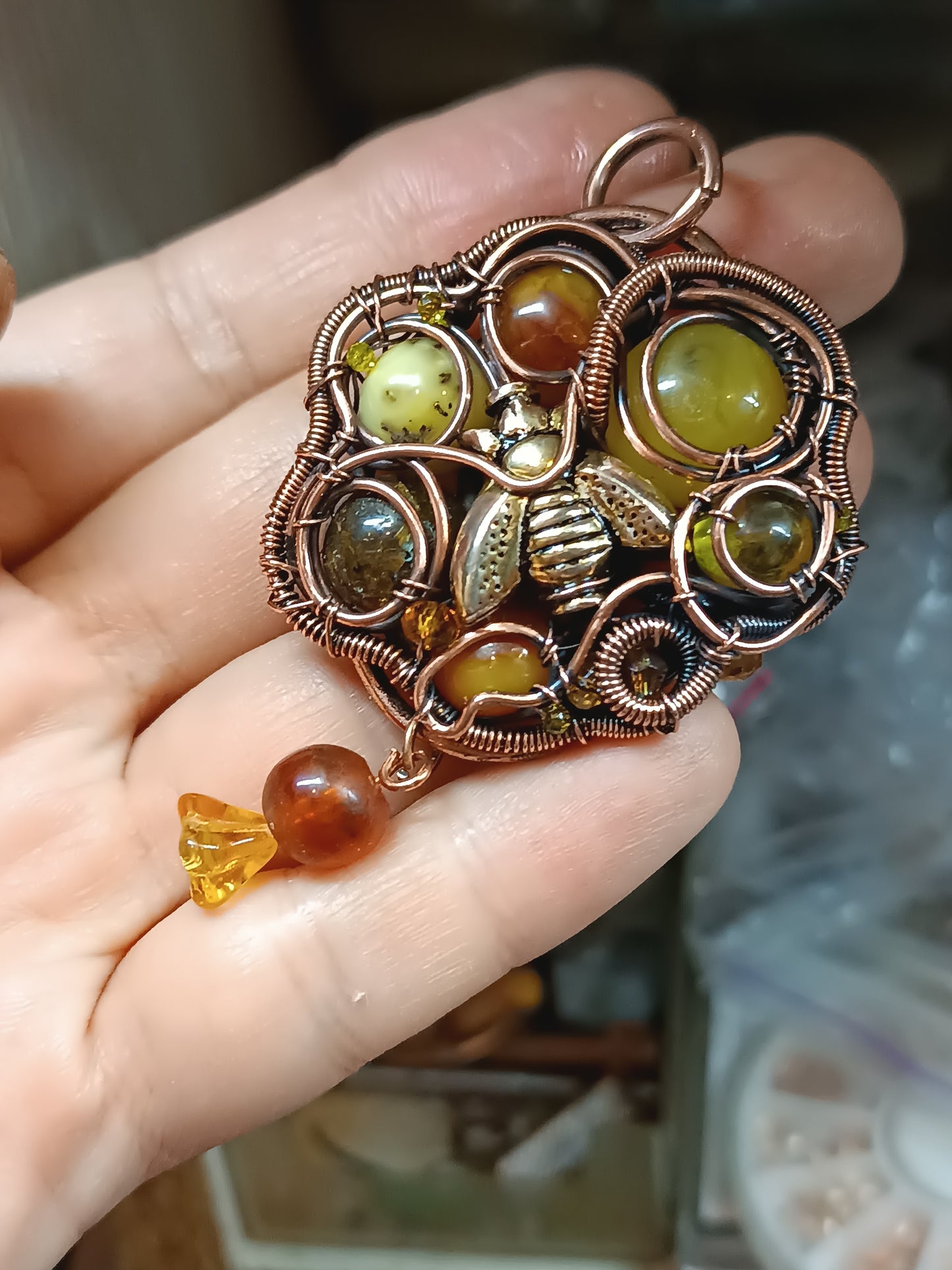 Bee pollinating. Wire wrapped pendant.