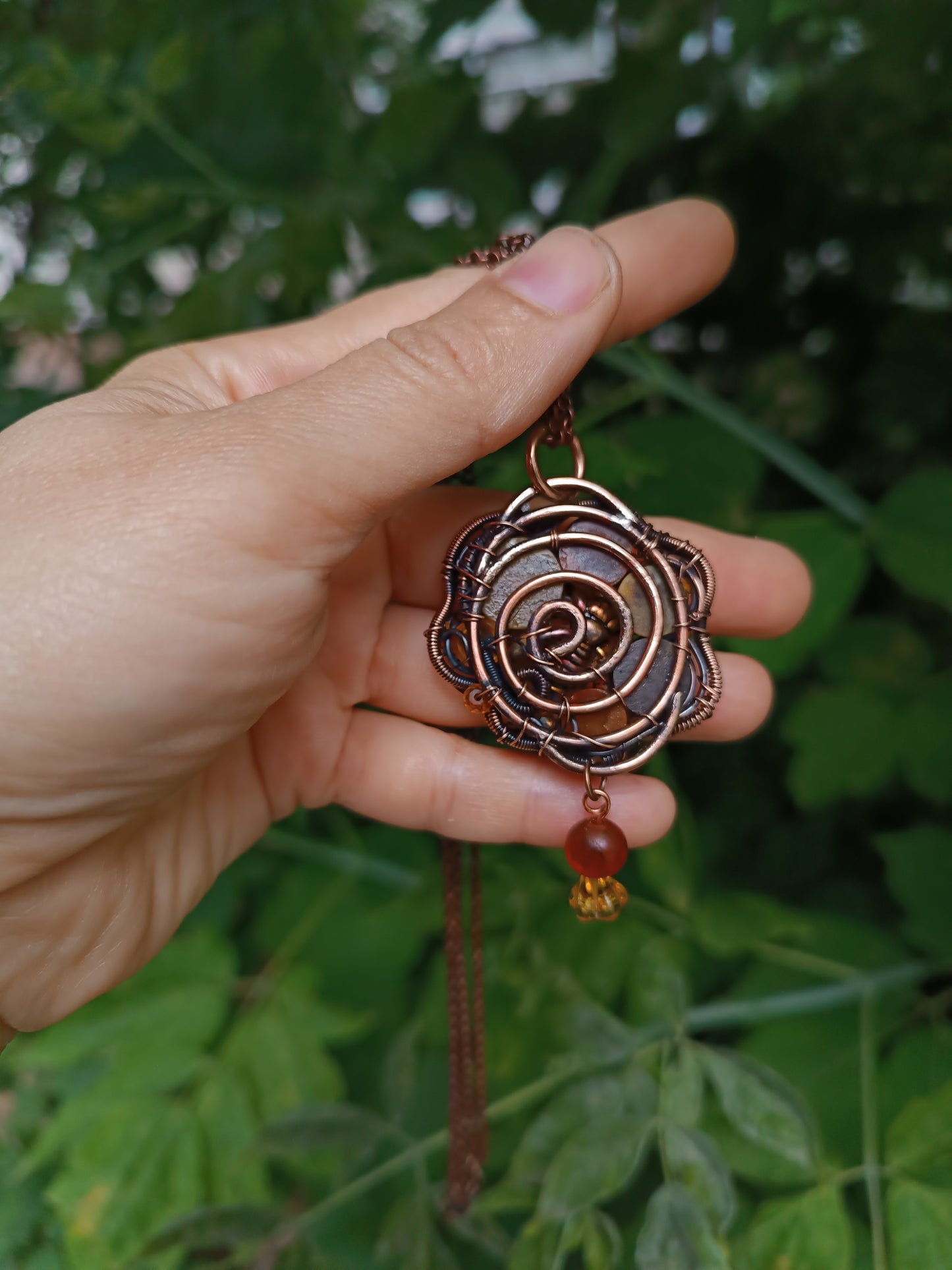 Bee pollinating. Wire wrapped pendant.