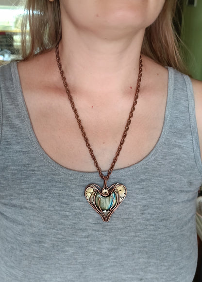 Mechanical heart necklace.