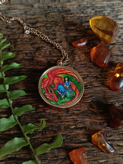 Red dragon miniature paining in the charm. Two sided!