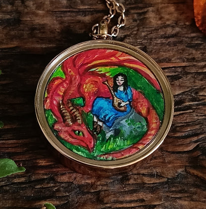 Red dragon miniature paining in the charm. Two sided!