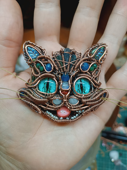 Blue cat necklace.