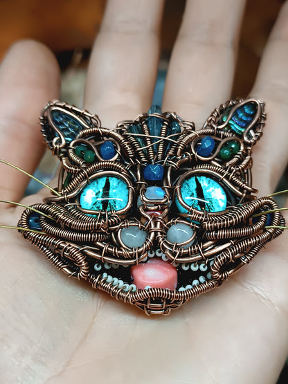 Blue cat necklace.