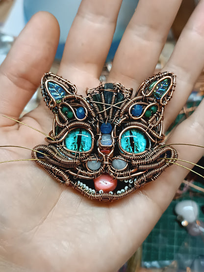 Blue cat necklace.