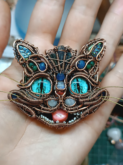 Blue cat necklace.