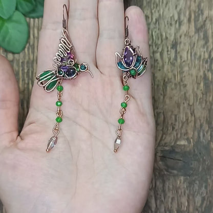 Humming bird and flower dangling earrings.