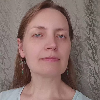 Humming bird and flower dangling earrings.