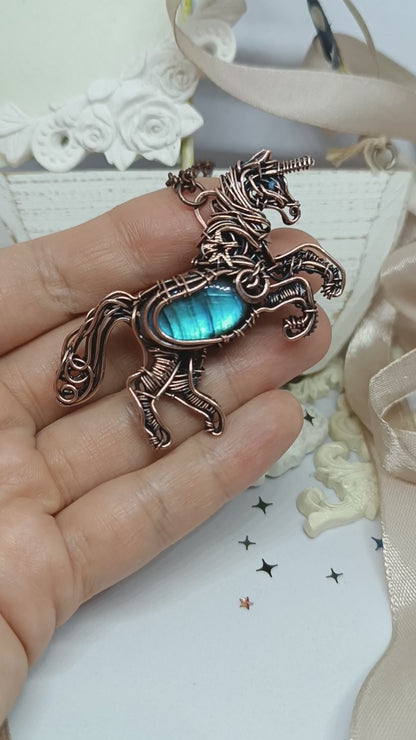 Unicorn and the falling star. Copper pendant with labradorites.