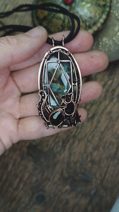 Cat in the window. Necklace