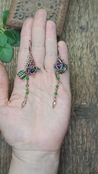 Humming bird and flower dangling earrings.